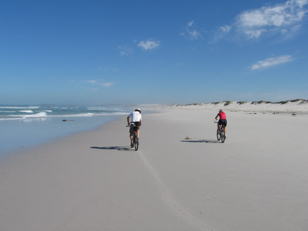 Cycling up the pristine beach at the Koeberg Nature Reserve